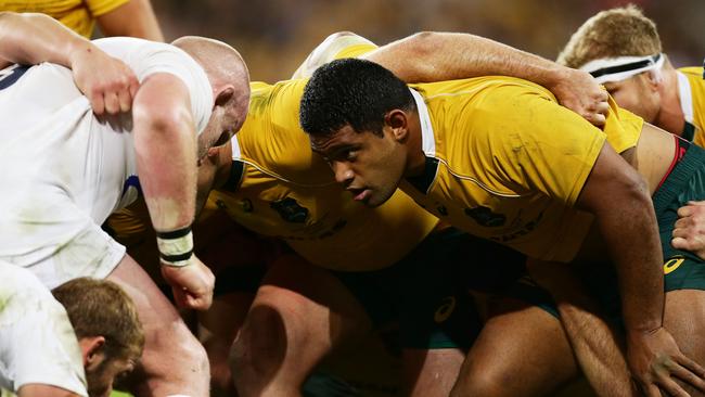 Scott Sio of the Wallabies and Dan Cole of England pack into the scrum.