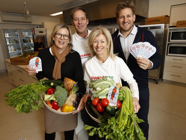 Celebrity chef and Coles ambassador Curtis Stone, right, launched Coles SecondBite Winter Appeal on Wednesday, with (from left) News Corp Australia community ambassador Penny Fowler, SecondBite CEO Steve Clifford and SecondBite co-founder Simone Carson. Picture: Alex Coppel