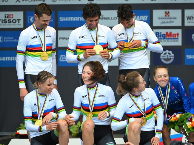 ZURICH, SWITZERLAND - SEPTEMBER 25: Gold medalists Michael Matthews, Ben O'connor, Jay Vine, Grace Brown, Brodie Chapman, Ruby Roseman-Gannon of Team Australia and Bronze medalists Elisa Longo Borghini and Gaia Realini of Team Italy pose on the podium during the 97th UCI Cycling World Championships Zurich 2024, Mixed Relay Team Time Trial a 53.7km one day race from Zurich to Zurich on September 25, 2024 in Zurich, Switzerland. (Photo by Tim de Waele/Getty Images)