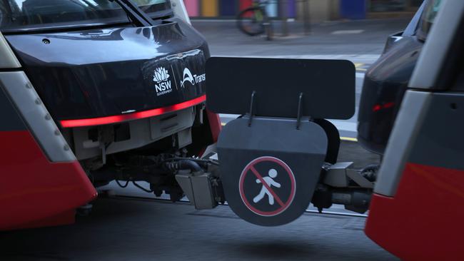 A witness said the girl was trying to jump through the gap between tram carriages when she fell through. Picture: NCA Newswire/Damian Shaw