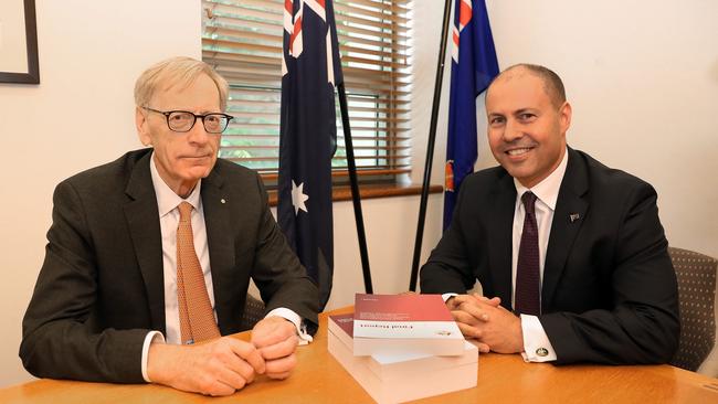 Commissioner Kenneth Hayne and Treasurer Josh Frydenberg with the final report from the Royal Commission into Misconduct in the Banking, Superannuation and Financial Services Industry. Picture: Kym Smith