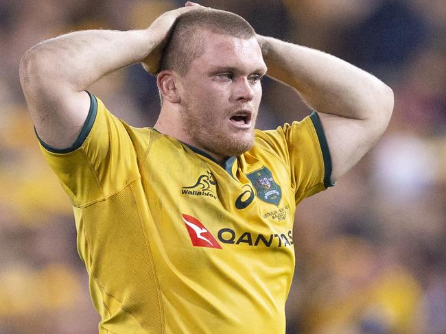 Tom Robertson of the Wallabies holds his head during the first Bledisloe Cup match between Australia and New Zealand at ANZ Stadium in Sydney, Saturday, August 18, 2018. (AAP Image/Steve Christo) NO ARCHIVING, EDITORIAL USE ONLY