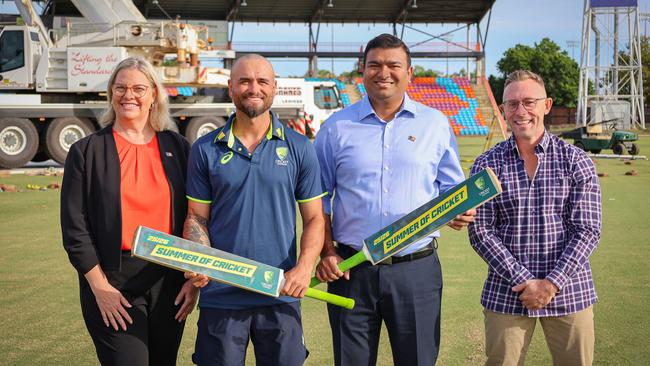 People, Sport and Culture minister Jinson Charls, Major Events minister Marie-Clare Boothby, NT Cricket CEO Gavin Dovey and Jake Weatherald as TIO Stadium's drop-in pitch is laid down.