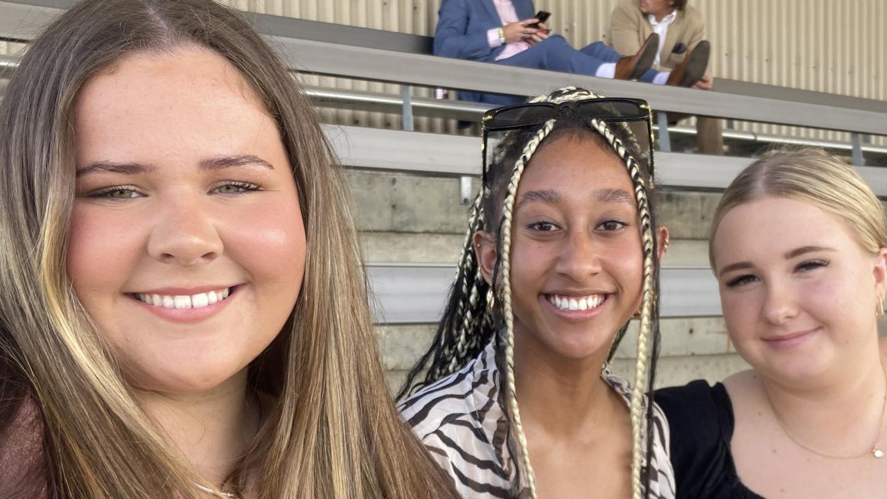 Paige Kelleher, Jorja Ranuve, and Charli Grattidge enjoy a day of fun at the Gympie Races on Saturday, July 15, 2023.