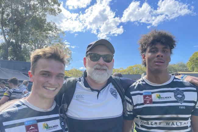 Brothers Colts 1 coach Greg Beaver with players Will Cartwright (left, scrumhalf) and Kadin Pritchard (right).