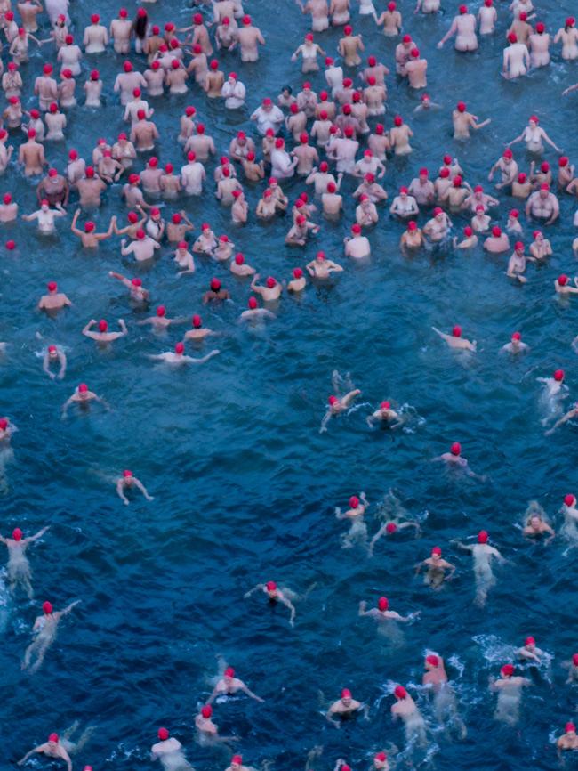 Dark Mofo’s Nude Solstice Swim would probably be much more bearable in Cairns. Picture: ROB BLAKERS/AAP