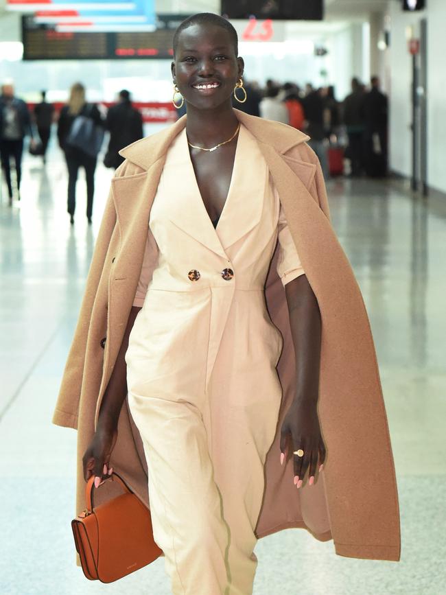 Adut Akech arriving at Melbourne Airport from Adelaide yesterday. Picture: Tony Gough