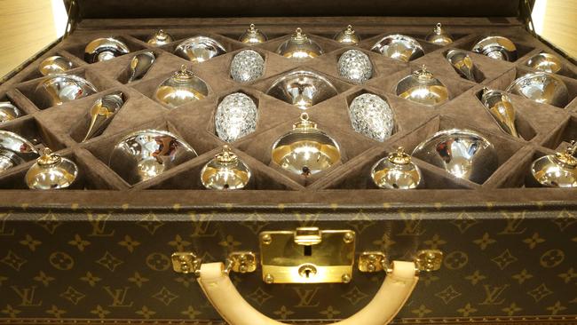 A Louis Vuitton travel trunk with Christmas baubles. Picture: Darren England