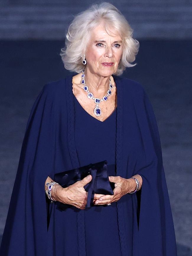 Queen Camilla wears Christian Dior at a state dinner at the Chateau de Versailles with French President, Emmanuel Macron and his wife Brigitte Macron on September 20, 2023. Photo: Getty Images