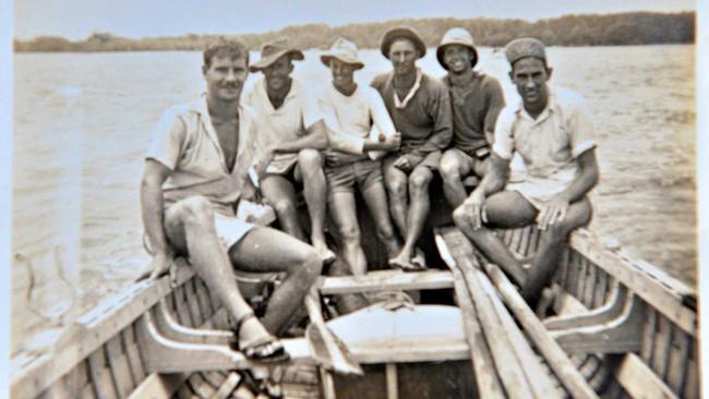 Rescued! The men safe and sound and heading back the mainland. Picture: John McCutcheon