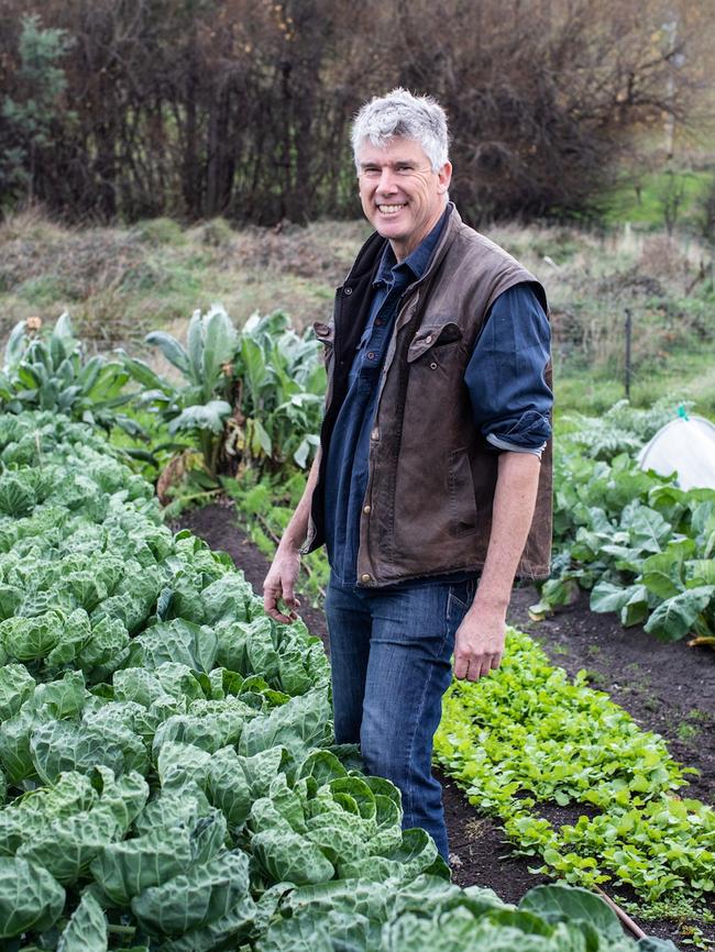 Matthew Evans in his vegie garden at Fat Pig Farm, at Glaziers Bay. Picture: Kitti Gould.