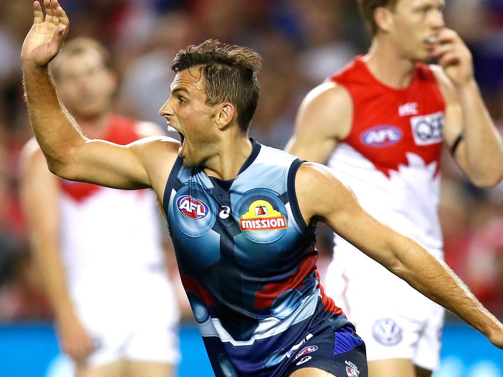 MELBOURNE, AUSTRALIA - MARCH 23: Sam Lloyd of the Bulldogs celebrates a goal during the 2019 AFL round 01 match between the Western Bulldogs and the Sydney Swans at Marvel Stadium on March 23, 2019 in Melbourne, Australia. (Photo by Dylan Burns/AFL Photos)