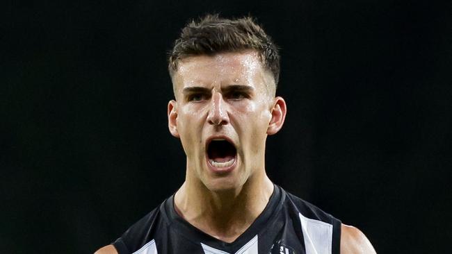 GOLD COAST, AUSTRALIA - JUNE 29: Nick Daicos of the Magpies celebrates a goal during the 2024 AFL Round 16 match between the Gold Coast SUNS and the Collingwood Magpies at People First Stadium on June 29, 2024 in Gold Coast, Australia. (Photo by Russell Freeman/AFL Photos via Getty Images)