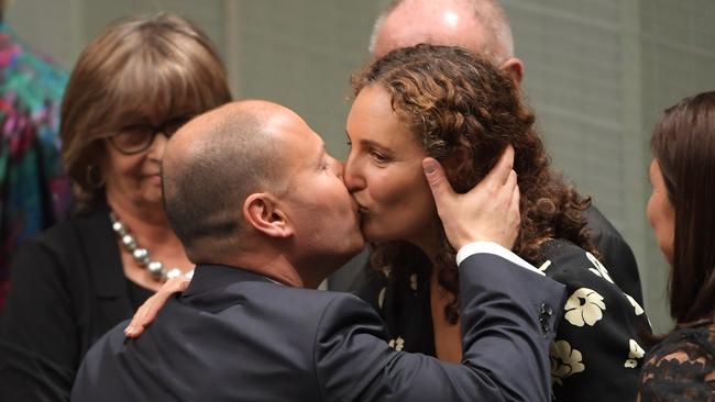 Treasurer Josh Frydenberg kisses his wife Amie Frydenberg after delivering the budget in the House of Representatives. Picture: Getty Images