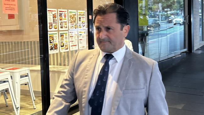 Bondi doctor John Balafas appeared at Downing Centre Local Court on Thursday, where charges of domestic violence were dismissed.