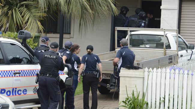 Tactical officers from the Queensland Police Special Emergency Response Team gained entry to a South Toowoomba home during a five-hour stand-off. Photo: Jarrard Potter.