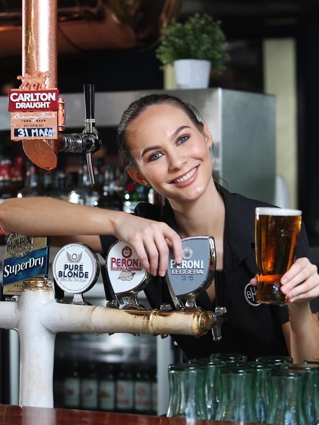 Tiarnna Smith pulls a Carlton. Beer choices are changing globally. Picture: Ric Frearson