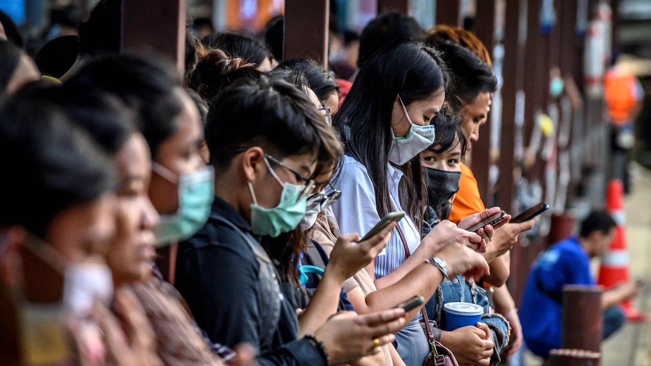 Your device screen is a “portable petri dish” for bacteria and diseases like coronavirus. Picture: Mladen Antonov/AFP