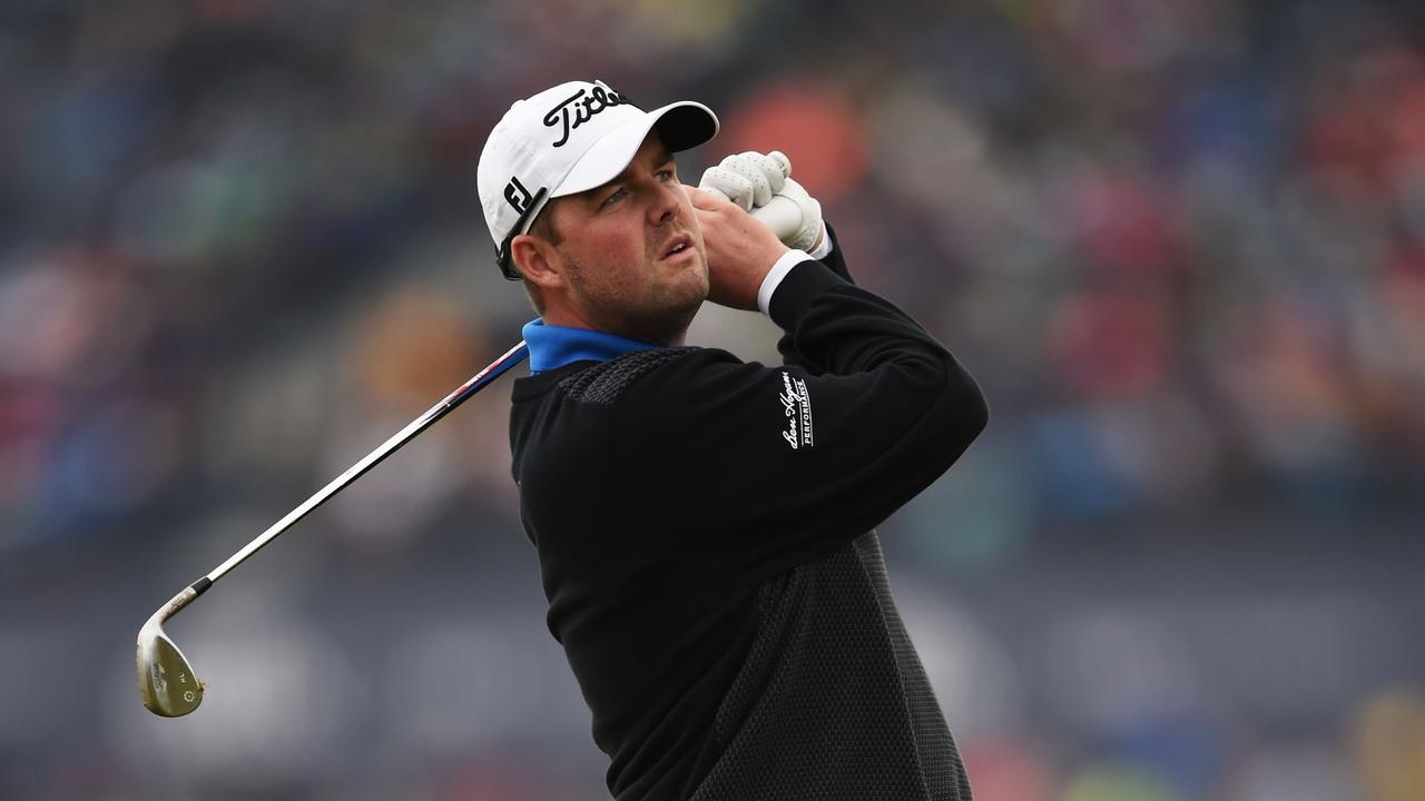 ST ANDREWS, SCOTLAND - JULY 20: Marc Leishman of Australia plays his approach shot on the second hole in the playoff during the final round of the 144th Open Championship at The Old Course on July 20, 2015 in St Andrews, Scotland. (Photo by Stuart Franklin/Getty Images)