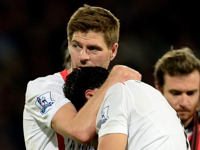 LONDON, ENGLAND - MAY 05: Steven Gerrard of Liverpool consoles the dejected Luis Suarez of Liverpool following their team's 3-3 draw during the Barclays Premier League match between Crystal Palace and Liverpool at Selhurst Park on May 5, 2014 in London, England. (Photo by Jamie McDonald/Getty Images)