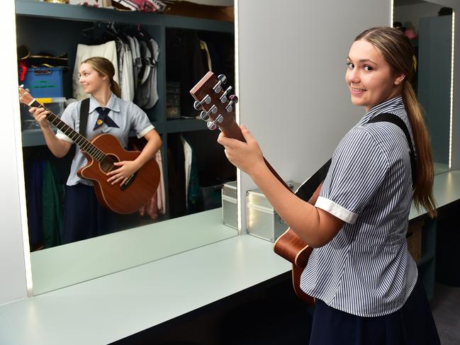 Chloe Dickinson, 17, in the new $19 million three-storey East Precinct building at St PatrickÃ•s College Townsville. Picture: Shae Beplate.