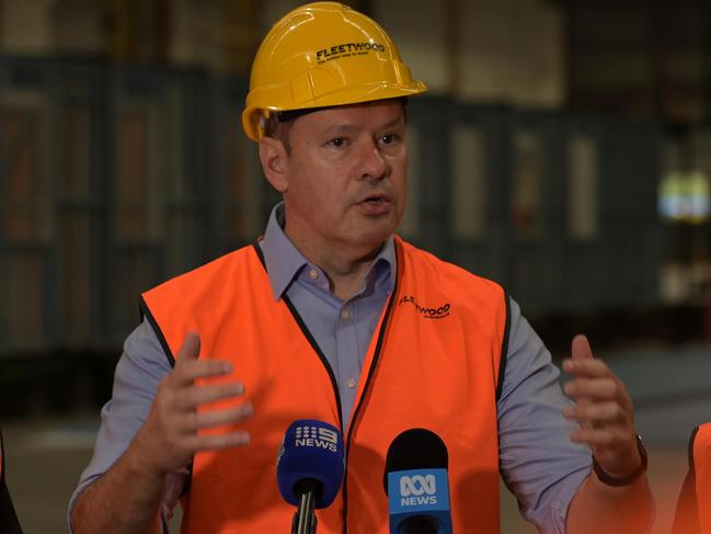 Industry Minister Ed Husic visiting Fleetwood Homes in Smithfield, where builders construct walls and bathrooms separately and transport entire pre-made houses on the back of a truck: Picture: Flavio Brancaleone