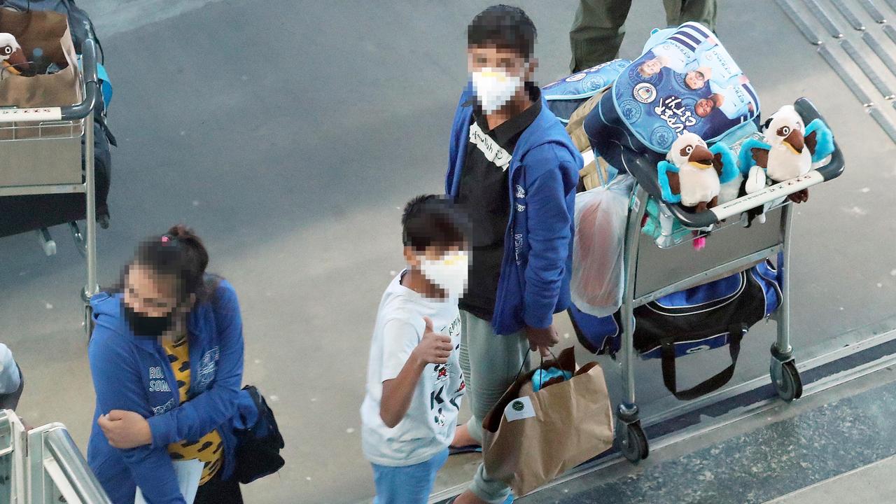 Children were among the people pulled out of Afghanistan and flown into Brisbane this morning. Picture: Liam Kidston.