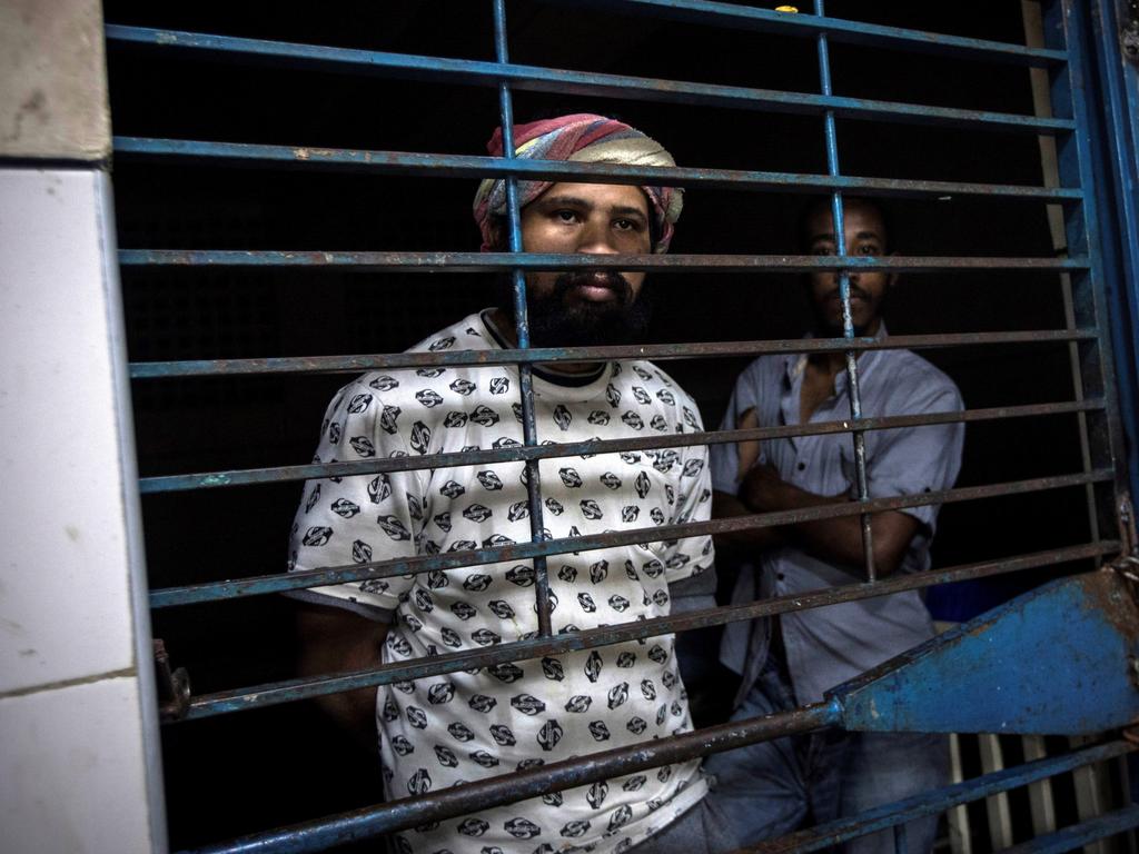 These two men are not prisoners, but are unwell. Picture: AAP/EPA.