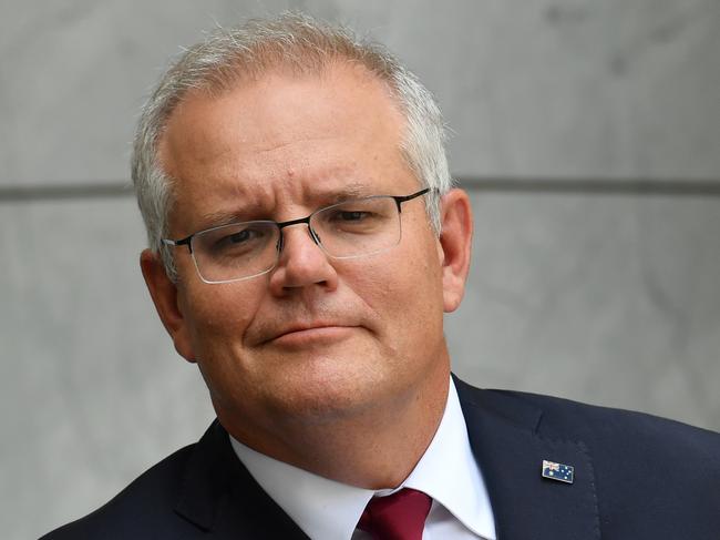 CANBERRA, AUSTRALIA - FEBRUARY 04: Prime Minister Scott Morrison during a press conference in the Prime Minister's Courtyard at Parliament House on February 04, 2021 in Canberra, Australia. The Pfizer/BioNTech vaccine has beenÃÂ provisionally approvedÃÂ by theÃÂ Therapeutic Goods Administration (TGA)ÃÂ for peopleÃÂ 16 years and older with the COVID-19 vaccine to be available in Australia at 50 hospital sites across the country, and in residential aged care and disability facilities. As part ofÃÂ AustraliaÃ¢â¬â¢s Vaccine and Treatment Strategy, the Australian Government has purchased  an additional 10 million doses of the Pfizer/BioNTech vaccine, and has the option to purchase more doses.ÃÂ  (Photo by Sam Mooy/Getty Images)