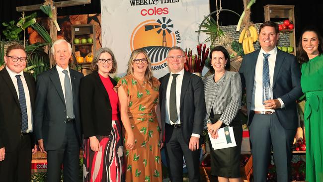 (From left) The Weekly Times editor James Wagstaff, Coles Group chairman James Graham, Coles chief executive Leah Weckert, Herald and Weekly Times chairman Penny Fowler, federal Agriculture Minister Murray Watt, Farmers of the Year Vanessa and Nigel Corish and MC Giaan Rooney. Picture: Yuri Kouzmin