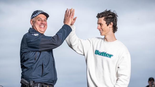 Inspector Terry Rowlands and high school graduate Coen Raymond, 18, preparing for schoolies. Picture: Jake Nowakowski