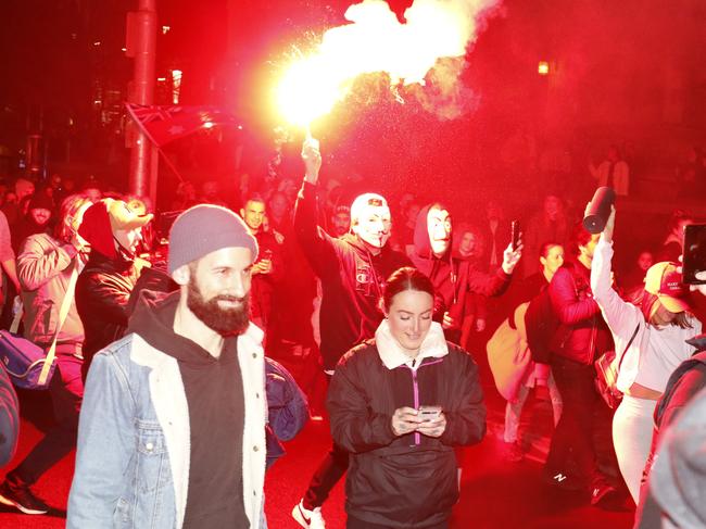 Protesters lit flares in Melbourne’s CBD. Picture: Matrix