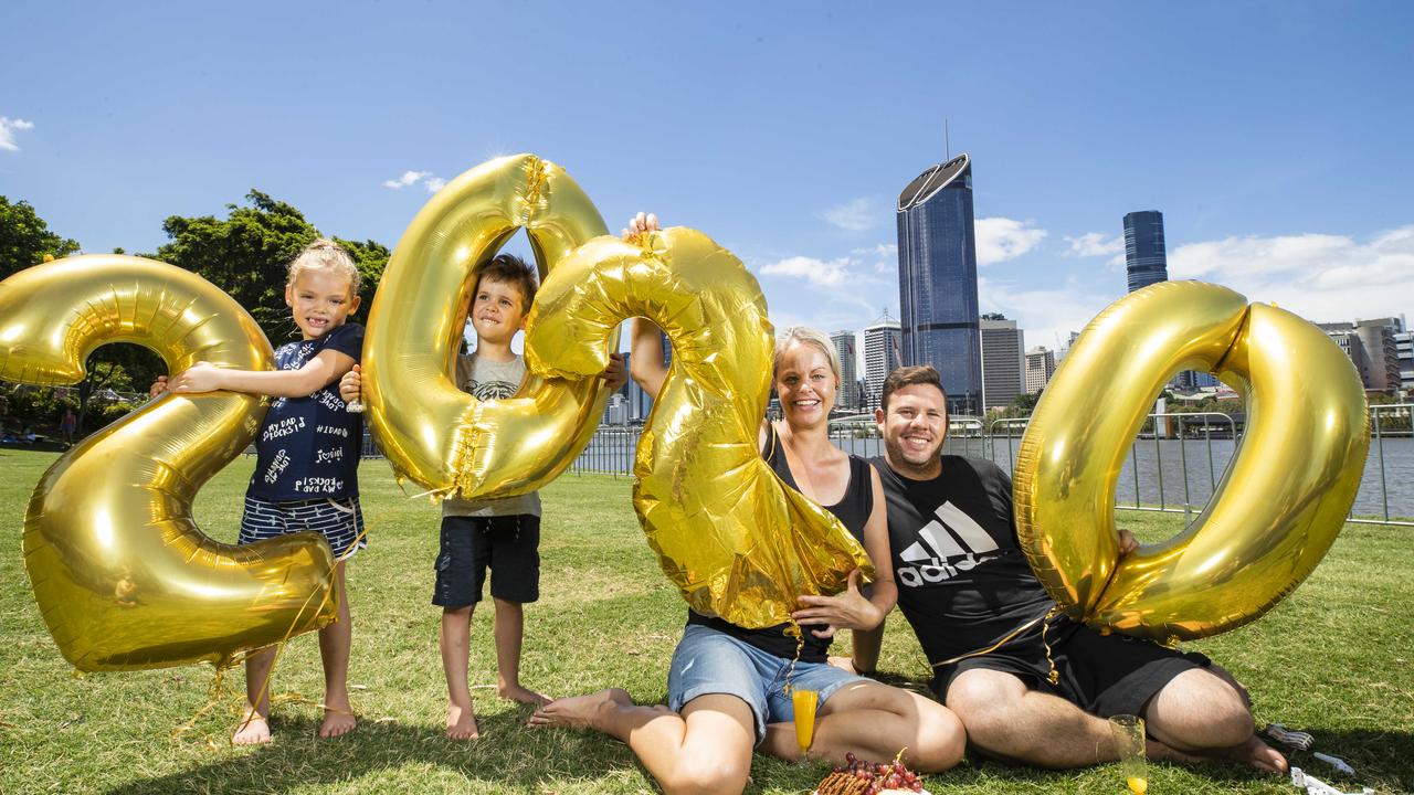 Yolanda and Shane Coetzee from Bulimba with children Ava, and Aiden, at Southbank New Year’s Eve 2019. Photo: Lachie Millard