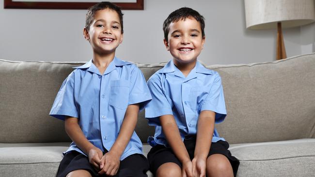 Twin brothers Lorcan (right) and Ruaidhri Nolan, 5, don’t get to use tablets at home. Picture: Jonathan Ng