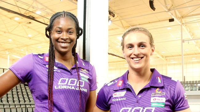 Firebirds players, L to R, Romelda Aiken a Goal Shooter with Gabi Simpson (captain) plays Wing Defence, posing in their new stadium, at Nathan, on Thursday February 20th, 2019 (Image AAP/Steve Pohlner)