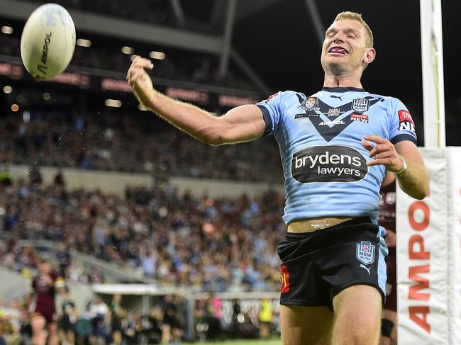 TOWNSVILLE, AUSTRALIA - JUNE 09:  Tom Trbojevic of the Blues scores a try during game one of the 2021 State of Origin series between the New South Wales Blues and the Queensland Maroons at Queensland Country Bank Stadium on June 09, 2021 in Townsville, Australia. (Photo by Ian Hitchcock/Getty Images)