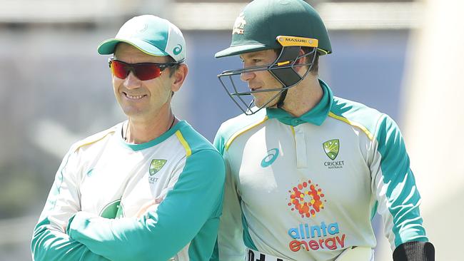 Tim Paine talks to Justin Langer during an Australian nets session at the Sydney Cricket Ground. Picture: Getty Images