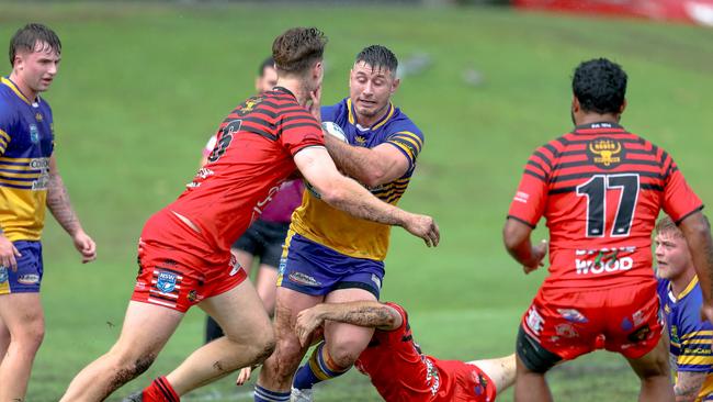 Matt Parata held by the defence. Picture: DC Sports Photography