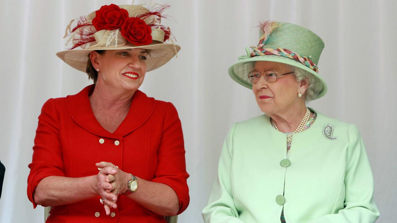 Queen Elizabeth II, right, sits with Queensland Premier Anna Bligh during a ceremony to rededicate the rainforest walk at Southbank, in Brisbane in 2011 (AP Photo/ Lyndon Mechielsen, Pool)