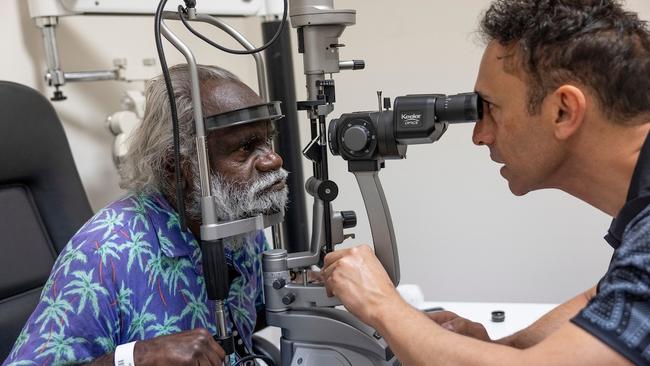 Dr Rallah-Baker and Mr Jimmy at an eye appointment. Picture: Michael Amendolia