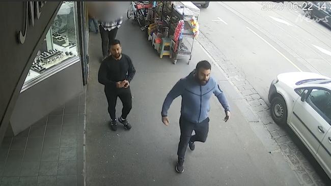 The two men were allegedly seen nearby the business. Picture: Victoria Police