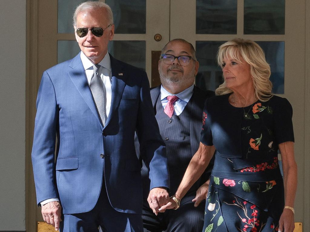 Joe and Jill Biden with Mayor of Bowie, Maryland, Tim Adams. Picture: Oliver Contreras/AFP