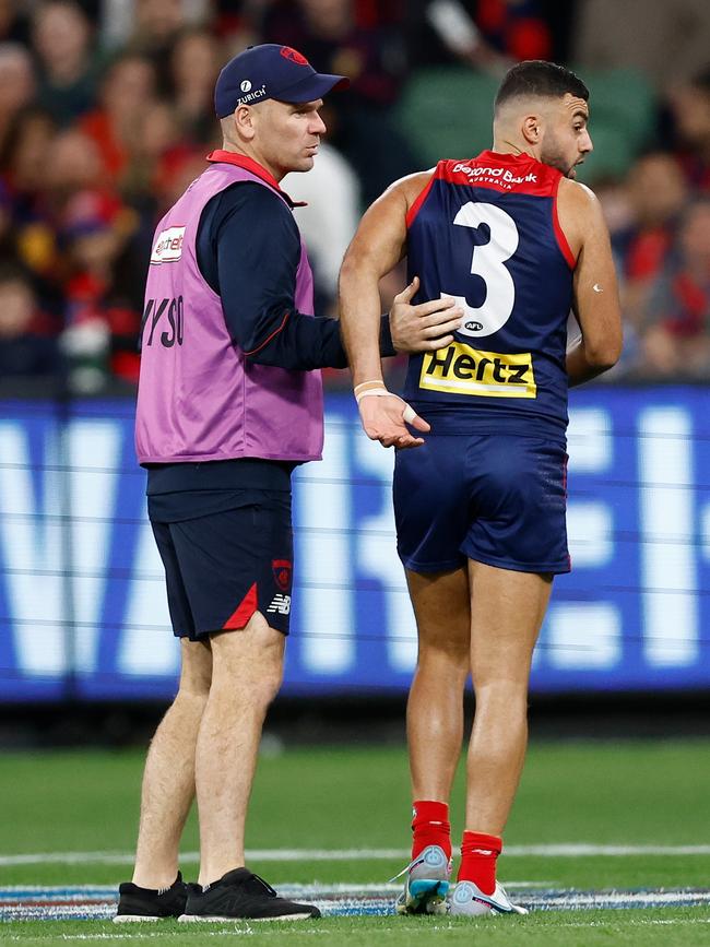 Christian Salem is helped from the field. Picture: Michael Willson/AFL Photos via Getty Images