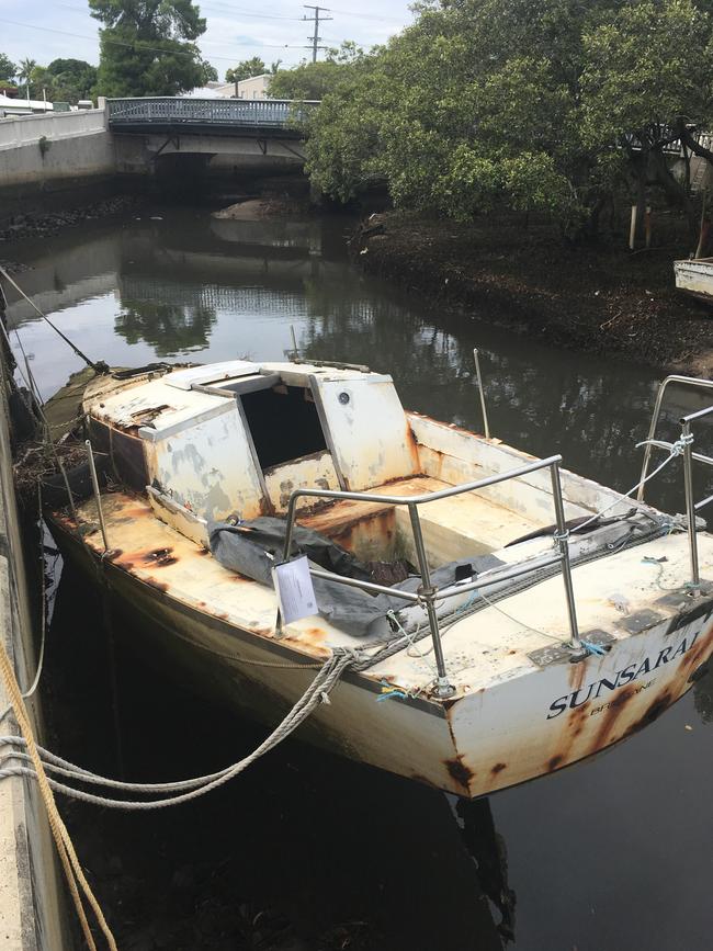 The boat known as Sunsarai is one of the hulls being removed from Wynnum Creek by Maritime Safety Queensland.