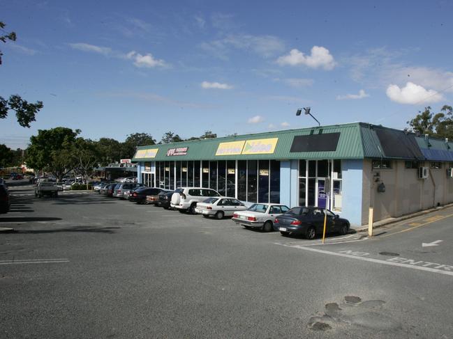  An older external shot of the centre shows the damaged, pot-holed carpark. 