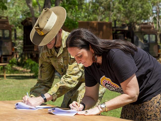 Leiutent General Simon Stuart and NIAA’s Group Manager for the Truth Telling Taskforce Andrea Kelly sign a memorandum of understanding between NIAA and Defence that will continue AACAP into the future. Picture: Floss Adams.