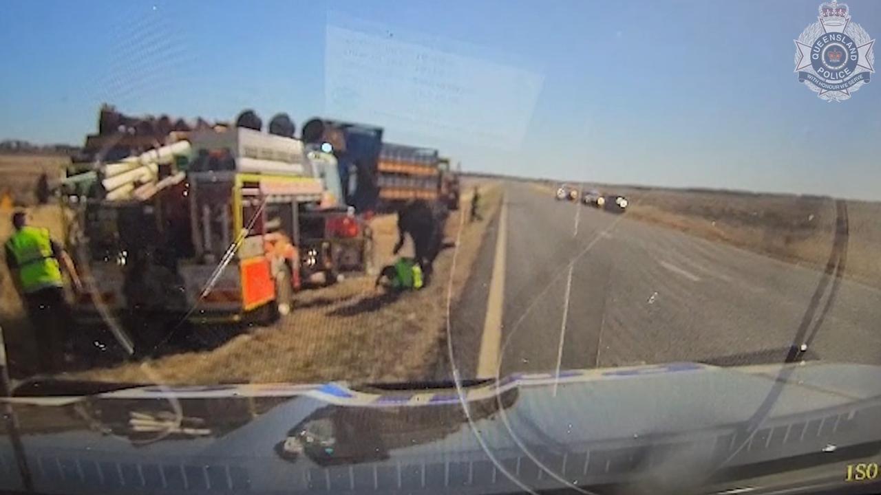 A Queensland Police officers was charged by a bull after responding to a livestock truck rollover along the New England Highway on July 26, at Morven, near Charleville.