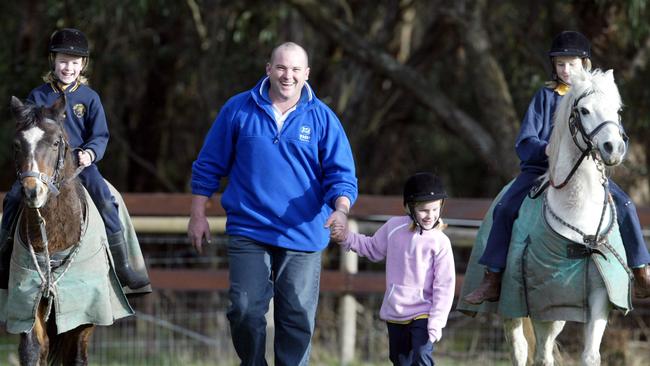 Peter Moody with daughters Breann and Celine, then 7, and Cara, then 9. 