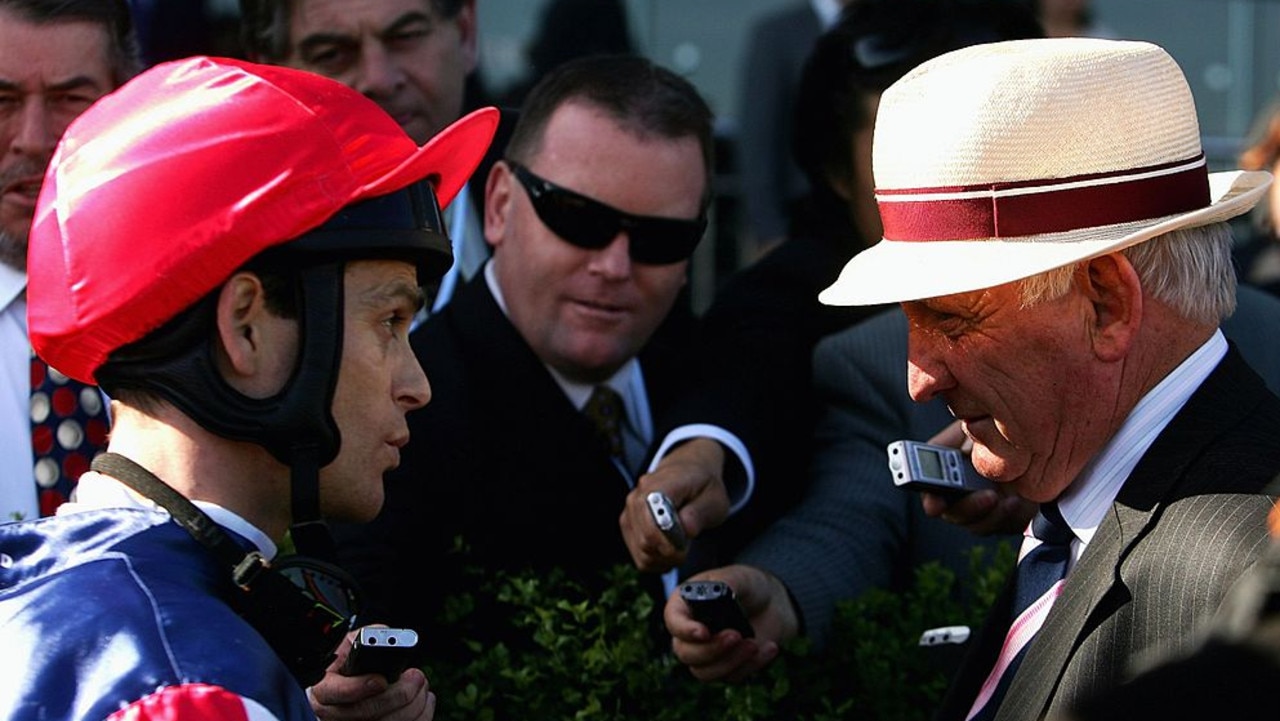 MELBOURNE, AUSTRALIA - OCTOBER 17:  Jockey Danny Nikolic talks with trainer Leon McDonald after riding Serious Speedto victory in the Schweppes Thousand Guineas  during the Thousand Guineas Day meeting at Caulfield Racecourse on October 17, 2007 in Melbourne, Australia.  (Photo by Mark Dadswell/Getty Images)