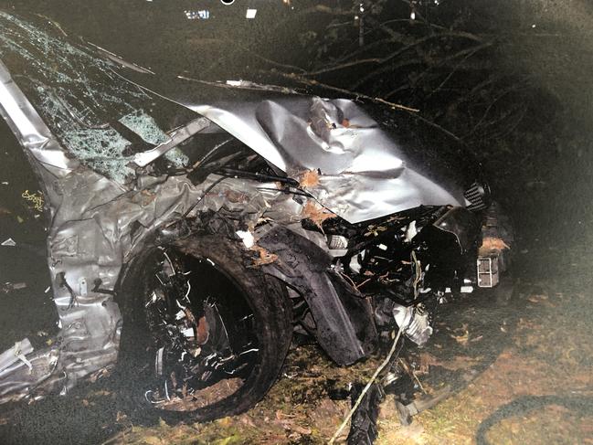 Crash scene pictures tendered in court of Marlee Rose Kelley's Holden Commodore after ploughing into a tree at Wyongah. Picture: supplied.